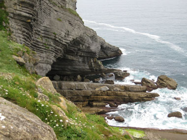 rocks under lighthouse